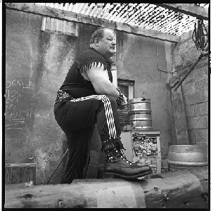 Mighty Dave Parkinson from Brookeborough, Co. Fermanagh, former circus strong-man billed as "Ireland's Strongest Man." Various shots including portraits of him oiled up and flexing his muscles