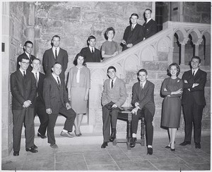 Boston College students pose for portrait in the Ford Tower at Bapst