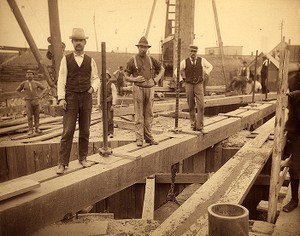 Three employees at construction site