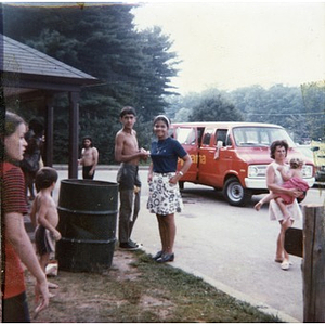 Latino youths stand outside the facilities at an unidentified park, while on a summer day trip sponsored by La Alianza Hispana