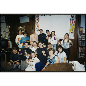 Group portrait of award winners holding their trophies at the Charlestown Best Year In School Program Awards Night