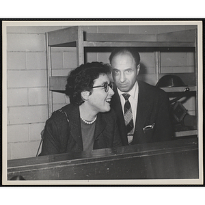 Joan McPartlin and an unidentified photographer, both of the Boston Globe, stand for a candid shot at Brandeis University