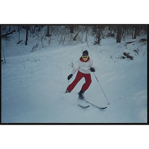 A child skis on a slope