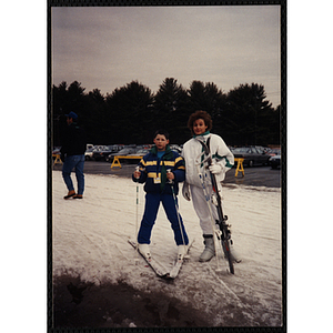 A woman and boy on skis pose for a shot at Nashoba Valley