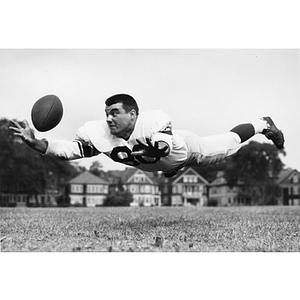 Football player makes mid-air catch