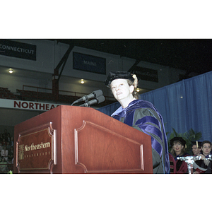 Unidentified woman speaking at podium