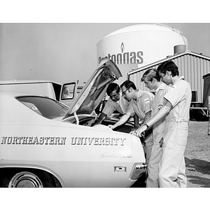 Engineering students working on an "Ecology Car"