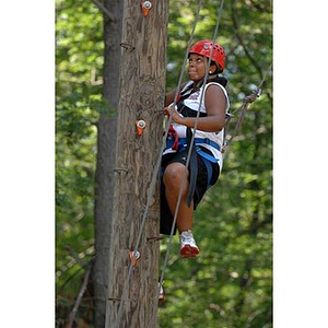 Ana Hidalgo climbs at the Torch Scholars Project Adventure Ropes Course