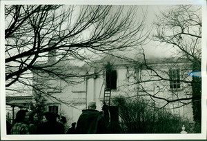 View of firemen putting out fire at the Lady Pepperell House, Kittery Point, Maine, December 27, 1945