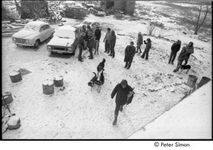 Group standing outside farmhouse