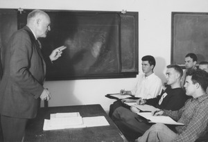 Ralph A. Van Meter lecturing in a classroom