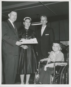 Willis C. Gorthy presenting citation to man and woman at Institute Day