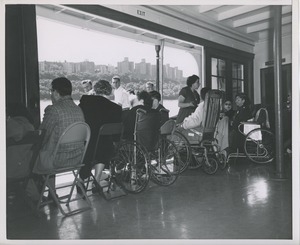 Wheelchair users gaze out on city during annual boat ride