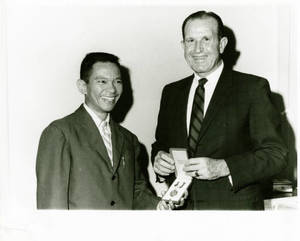 Ferdinand M. Siregar presenting All-Indonesia Swimming Foundation Silver Medal to Dr. Attallah "Ted" Kidess, 1964