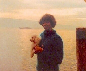 A Photograph of Marlow Monique Dickson Holding a Dog