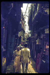 Street scene, with view down a narrow alley