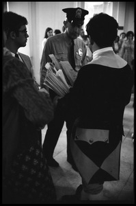 Jerry Rubin dressed in Revolutionary War uniform and distributing literature at the House Un-American Activities Committee inquiry into New Left activism