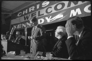 Robert F. Kennedy speaking at a dinner while stumping for Democratic candidates in the northern Midwest
