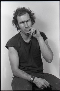 Studio portrait of Richard Safft, seated on a stool