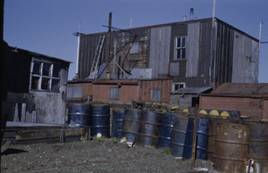 House and oil drums