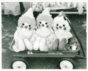 Three Raggedy Anns in wagon