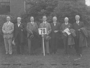 Members of class of 1878; Tuckerman, Stockbridge, Howe, Foot, Loomis, Baker and Brigham standing outdoors