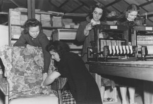 Mildred Briggs and three women during a Home Economics class