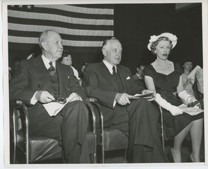 Jeremiah Milbank, Sr., Helen Menken and an unidentified man on stage at Institute Day