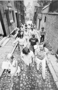Suffolk University students walk up Cedar Lane, 1972