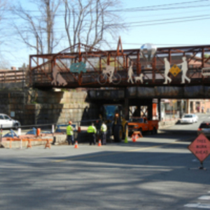 Repair of the retaining wall and sidewalk by the Northampton Department of Public Works, Main Street near the railroad overpass.