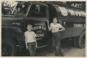 Wayne and Daniel Locke with Thomas and Young mobile oil truck