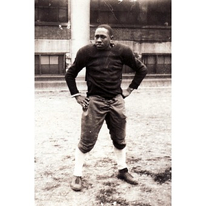 A young player for the Eagles Athletic Association poses for the camera