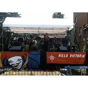 Band performing on the outdoor stage at Festival Betances.