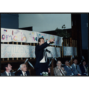 Former Boston Celtic Dave Cowens points while speaking at a Kiwanis Awards Night