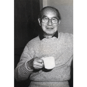 Henry Wong drinking coffee