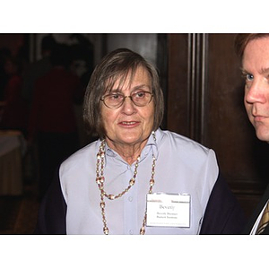 Beverly Brenner and another guest talk at the gala dinner for John Hatsopoulos