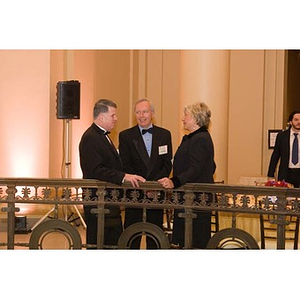 Three people converse at the inauguration celebration of President Aoun at the Museum of Fine Arts