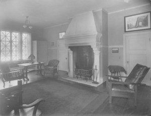 Interior view of living room looking toward windows, location unknown, undated