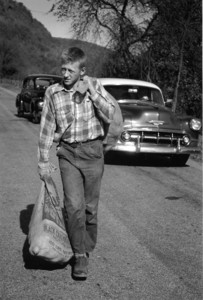 Boy with potato sack, East Whately, Mass., 1954