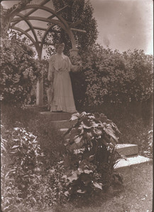 Emily D. Tyson in the garden archway, Hamilton House Gardens, South Berwick, Maine, September 1903