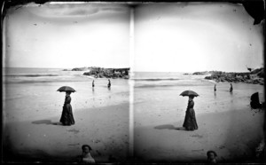 Woman with umbrella; J.H. Williams, photographer