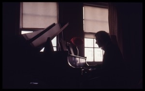Stephen Stills playing piano in Judy Collins's apartment