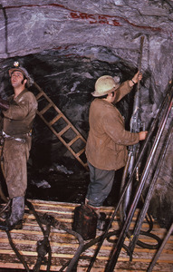 Miners setting up drill holes