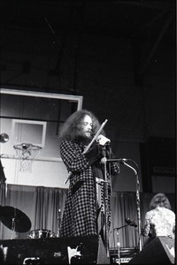 Jethro Tull in concert at the Springfield Civic Center: Ian Anderson at microphone with flute