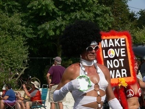 Parade marchers with oversized Afro wig : Provincetown Carnival parade
