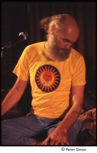 Ram Dass on stage with Amazing Grace