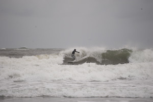 Surfer riding a wave