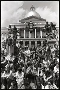 Demonstration at State House against the killings at Kent State: protesters seated on State House steps