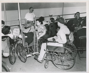 Wheelchair users talking during annual boat ride