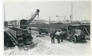 Unloading sections of Atlantic Avenue Elevated at Charlestown yard, ten sections saved for use in event of air raid damage